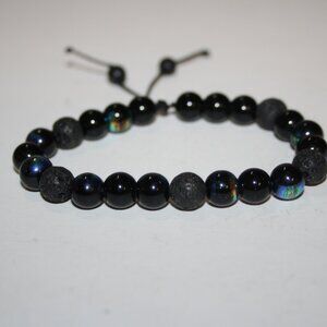 Beautiful black metallic glass and LAVA beaded bracelet Adjustable